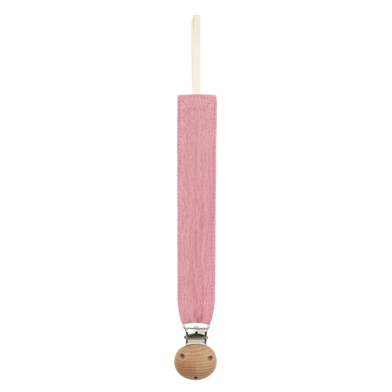 Attache-tétine en coton rose ancien avec clip en bois naturel, présentée seule sur fond blanc.