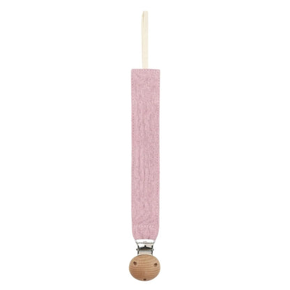 Attache-tétine en coton rose avec clip en bois naturel, présentée seule sur fond blanc.