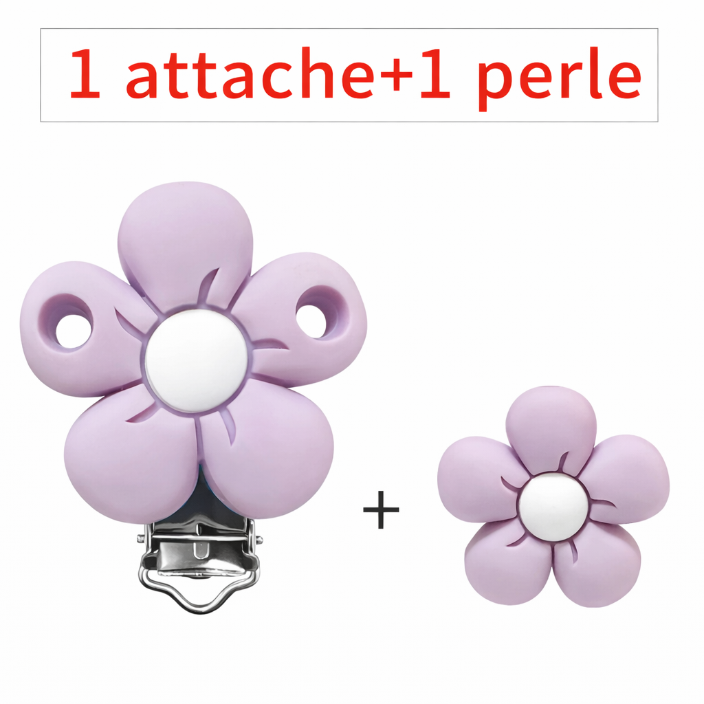 Kit composé d’un clip attache-tétine et d’une perle en silicone en forme de fleur lilas avec centre blanc, pour création personnalisée.