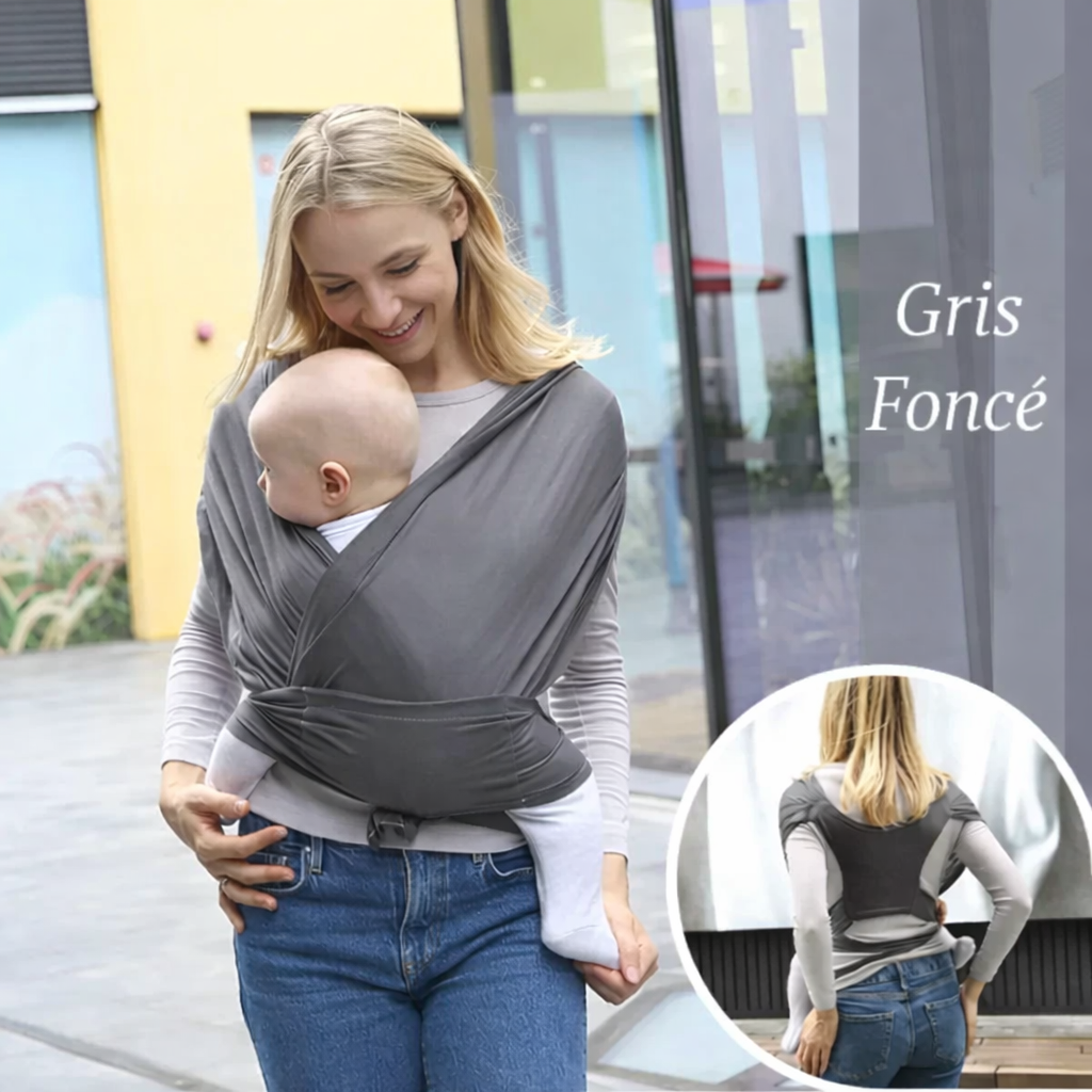 Maman portant son bébé en écharpe de portage gris foncé, porte-bébé ventral confortable et sécurisé
