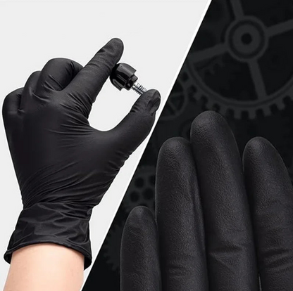 Gants jetables en nitrile noir texturés offrant une excellente adhérence et résistance, adaptés aux travaux mécaniques, nettoyage et usages professionnels.