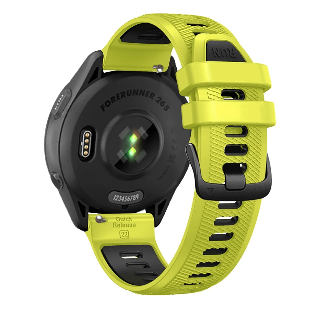 Montre GPS Garmin Forerunner 265 avec bracelet sport vert jaune et noir, vue arrière capteur cardiaque