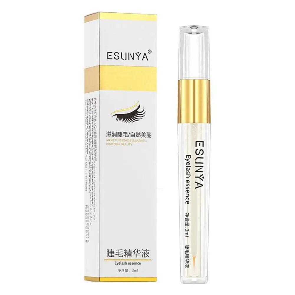 Sérum pour les cils ESUNYA en stick, flacon transparent avec capuchon doré, présenté avec sa boîte blanche et dorée